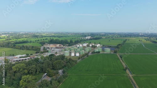Aerial View of Oil Storage Terminal with Large Petroleum Storage Tanks in Italy
