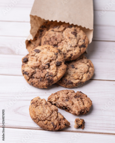 Chocolate chip cookies over wooden table