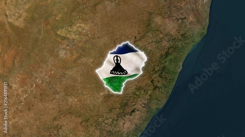 Lesotho map shape textured with national flag colors fluttering in motion animation footage showing aerial satellite land view background landscape