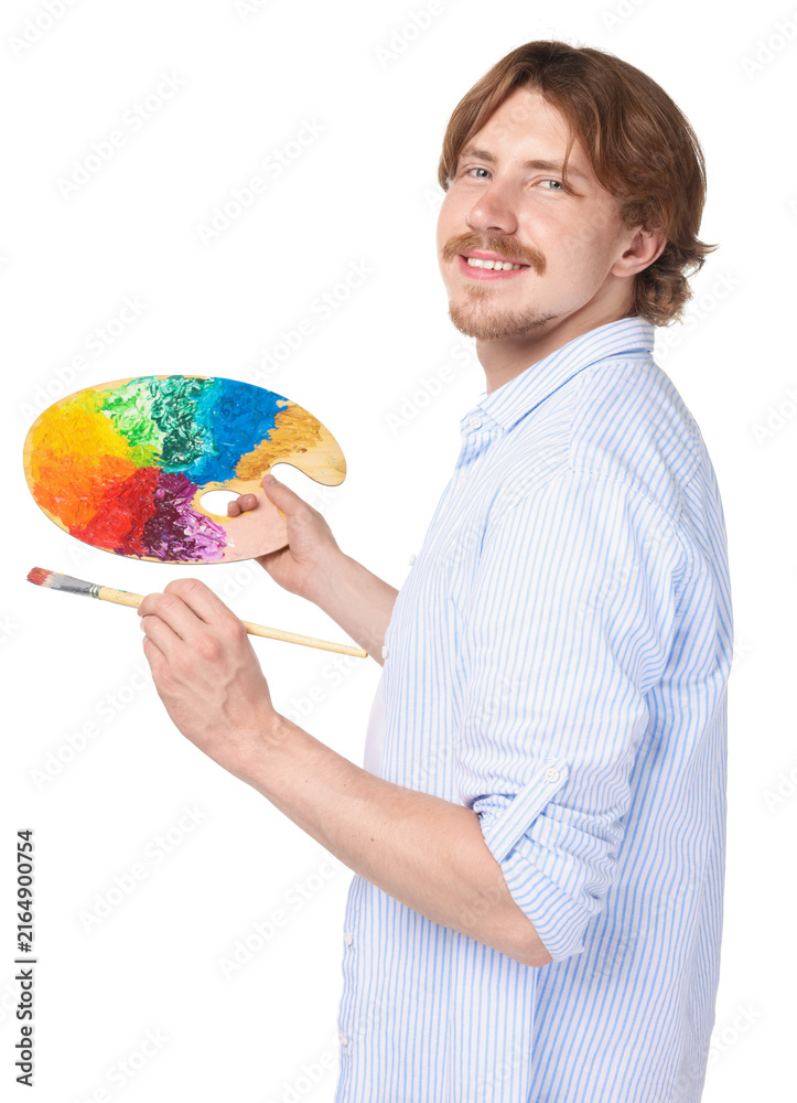 Fototapeta premium Man with painting tools on white background. Young artist