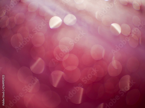 Bild auf Leinwand Glistening water droplets rest on a vivid red surface
