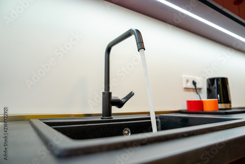 Canvas Print Urban residential area experiencing frequent water supply interruptions, dry taps and infrastructure issues, highlighting public utility problems and daily household inconvenience
