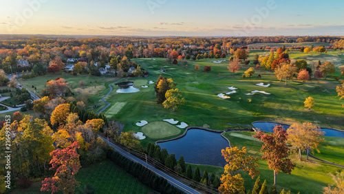 Aerial View of a Golf Course in Autumn with Colorful Fall Foliage in Greenville, Delaware