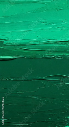 Abstract hand-painted landscape background featuring deep jade and forest green tones with rich layered brushwork and subtle granulation, creative, minimalist, modern