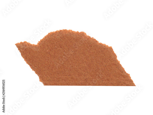 Rough torn kraft paper piece with natural brown texture for design