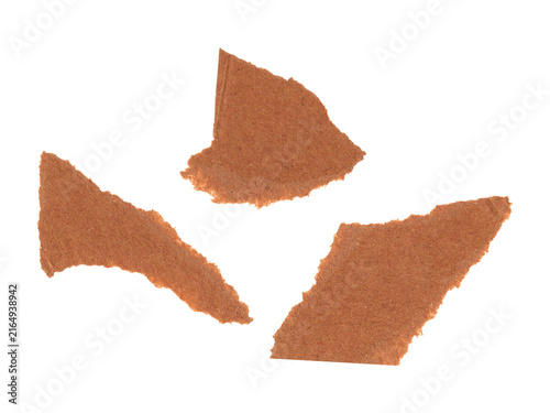 Torn kraft paper pieces with rough edges for creative collage design