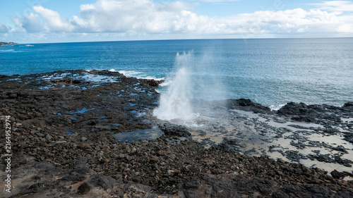 Bild auf Leinwand Spouting Horn geyser blows on the sunny shores of Kauai, Hawaii