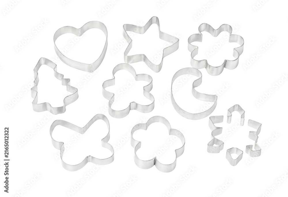 Fototapeta premium Assorted metal cookie cutters in various holiday and decorative shapes on transparent background transparent background