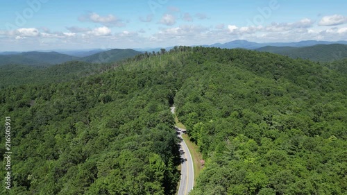 Aerial view overlooking a road leading through Oconee State Park with the foothills in the background in northwest South Carolina.