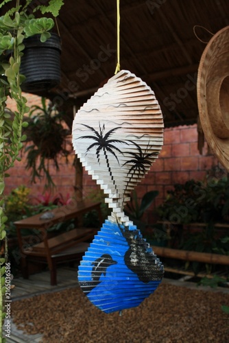 Canvastavla A hanging decoration made of wood arranged in a long spiral, revealing a unique pattern when spun