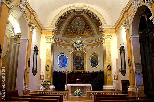 MONDAVIO, ITALY - AUGUST 9, 2025: Collegiata dei SS. Pietro e Paterniano. At the center of the apse stands 