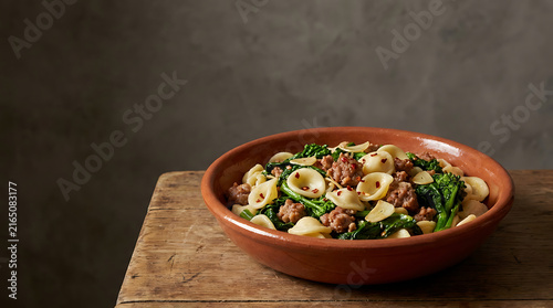 Traditional Pugliese Orecchiette Pasta with Vegetables in a Rustic Bowl