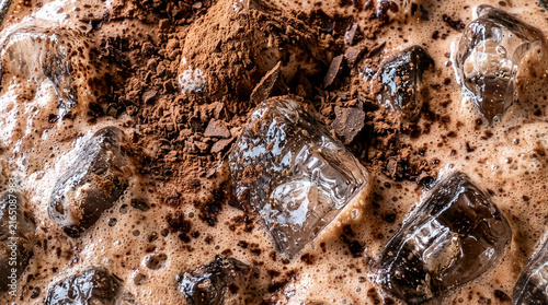 Iced Chocolate Drink with Cocoa Powder and Ice Cubes Close Up