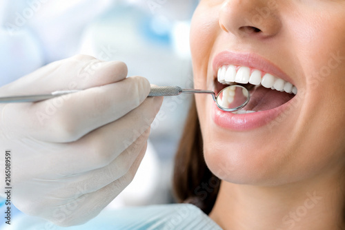 Close-Up Routine Dental Examination With Mirror