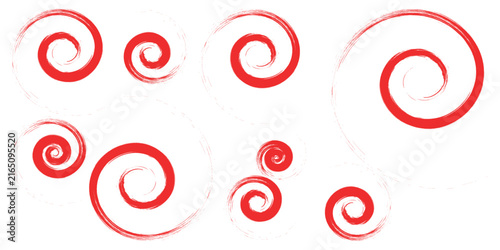 Collection of red spiral shapes against a lightly textured white background