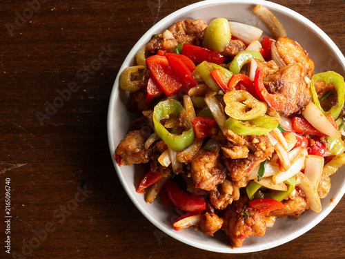 Canvas Print stir fried fish fillet with garlic, onion, chili and bell peppers