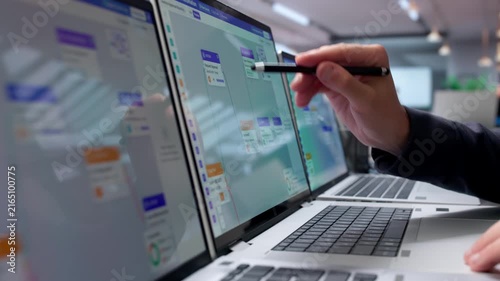 Young Businessman Managing Automated Workflow System On Laptop