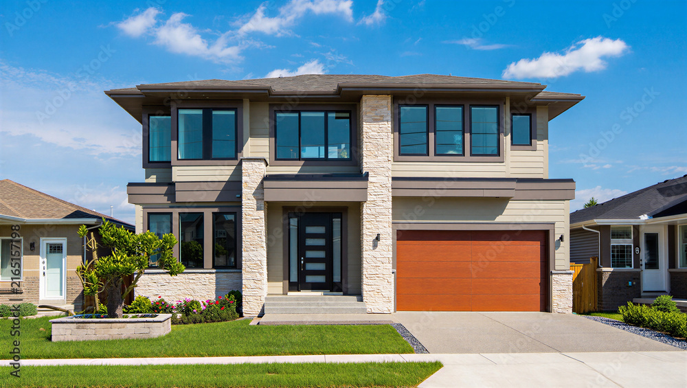 Fototapeta premium Modern suburban house with contemporary architecture and landscaping real estate two story