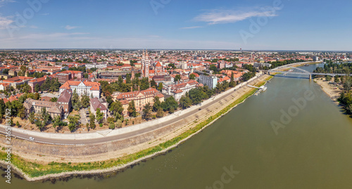 Fotografie Aerial panoramic view of Szeged city center, Tisza river, and Votive Church, Hun