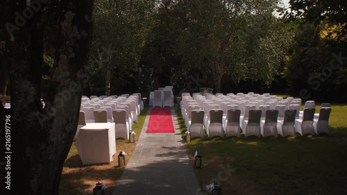 Summer Wedding beautiful garden woodland red carpet white chairs bride tracking shot