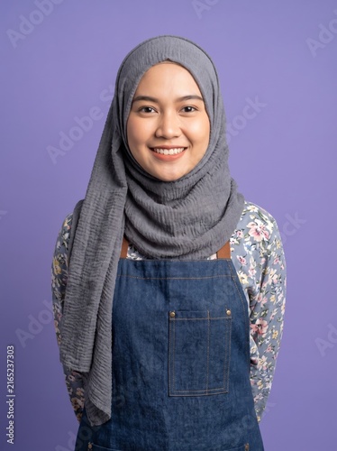 Smiling woman wearing hijab