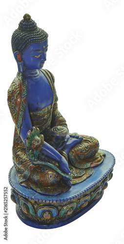 Blue medicine buddha statue meditating, bringing healing