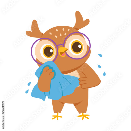 Obraz na plátne A cute owl drying off with a towel, ideal for bath time, hygiene, grooming, and everyday routine themes