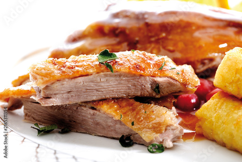 Roast goose with side dishes, close-up