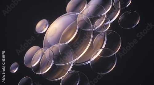 Floating transparent glass lenses and spheres arranged in an abstract composition with transparent floating abstract
