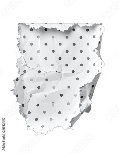 Crumpled white paper with black polka dots on a black background.