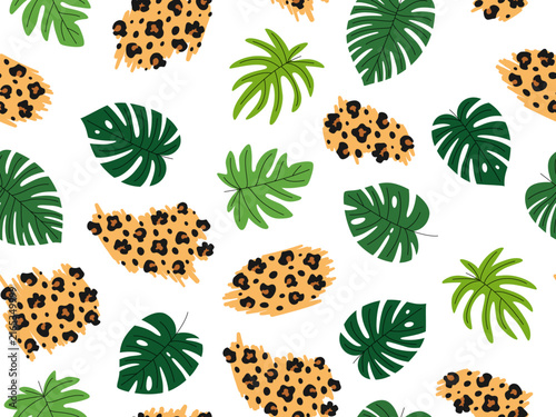 Animalistic seamless pattern with hand-drawn spots of leopard skin and tropical leaves. Exotic background.
