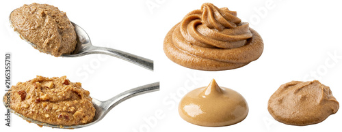 Fotografie A collection of almond butter dollops and spoonfuls showing smooth, crunchy, creamy, and rustic textures
