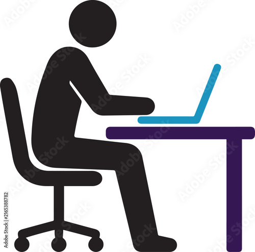 Business professional working on laptop at desk in modern office environment