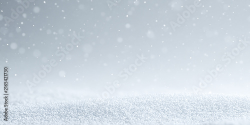 Winter snow banner background with falling snowflakes. Textured snowdrift and blurry soft bokeh 