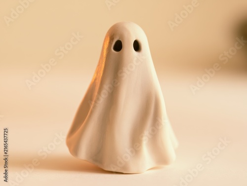 Ceramic Halloween Ghost on Cream Background