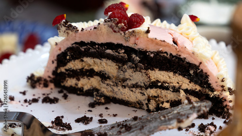 Chocolate Birthday Cake Slice with Raspberry Decoration and Filling