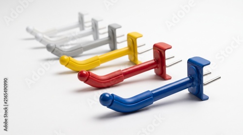 Color coded peg hooks for modular fixture systems
