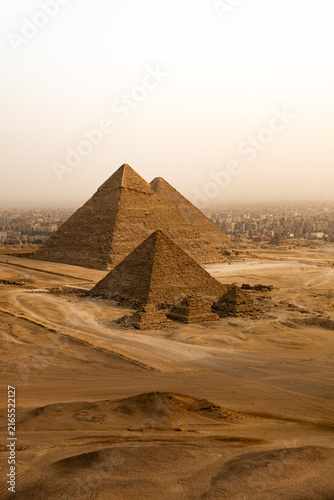 Photography The famous Giza pyramids in the desert in Egypt as seen from a bird eye while flying