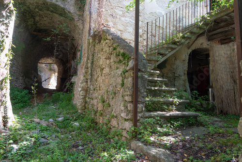 Bild auf Leinwand Campo, a secluded hamlet on Lake Garda, offers a timeless atmosphere, stone houses, narrow paths and breathtaking views over the lake and surrounding mountains