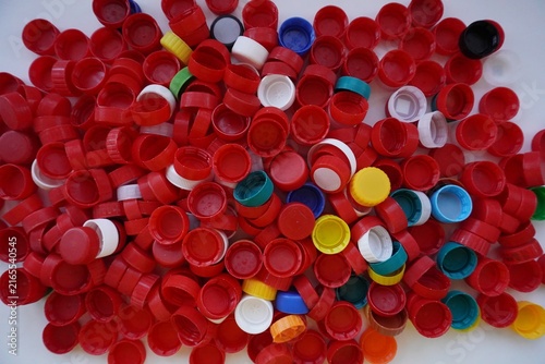 Obraz na plátně A bunch of plastic caps with colorful elements