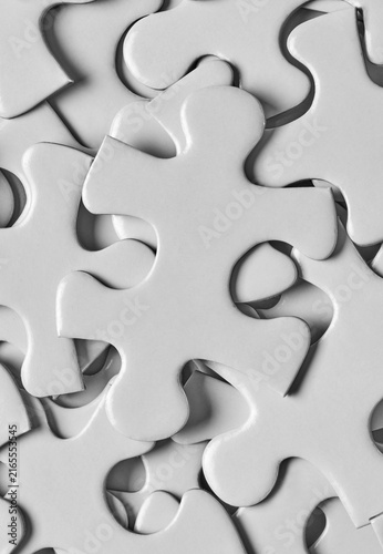 White puzzle pieces close up