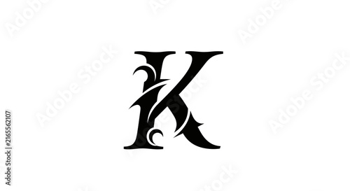 Ornate letter k monogram symbol with decorative flourishes