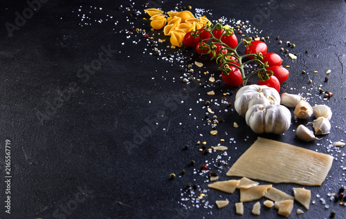 Konstfotografi Ingredients for cooking pasta on a black background