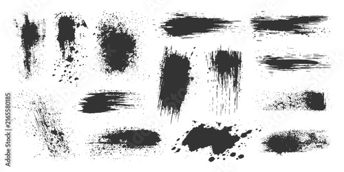 A collection of dynamic black ink splatters and brush strokes on a white background, perfect for graphic design and artistic projects.