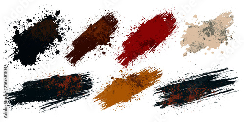 A collection of paint splatters and brush strokes in various earthy and vibrant colors, suggesting a creative and artistic theme.