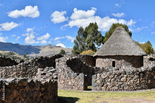 Qolqas storage buildings at the archaeological site of Raqchi, Peru