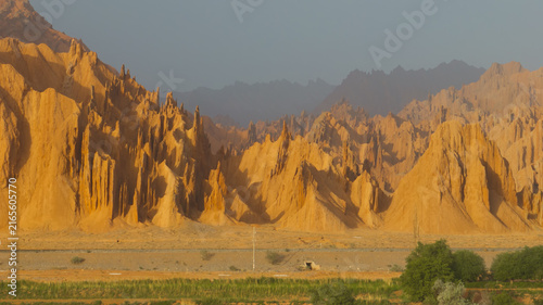 Canvas Print Golden Eroded Desert Mountains and Arid Valley