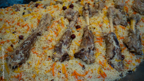 Traditional rice pilaf with roasted meat and vegetables