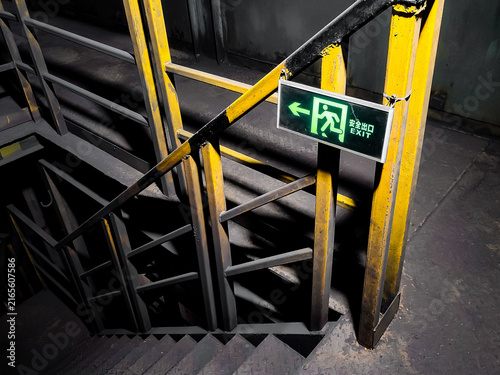 Konstfotografi Industrial staircase with bright yellow railings
