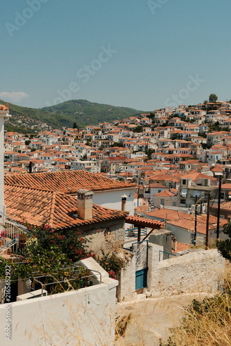 Fotografie Mediterranean village roofs cascading across hillside town
